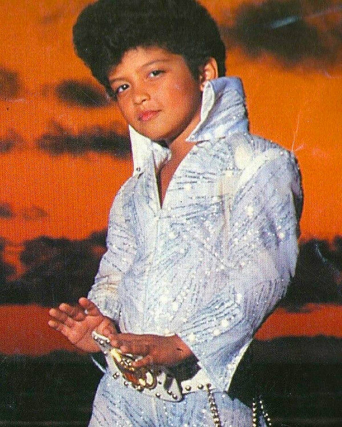 Little Bruno Mars as Elvis Presley