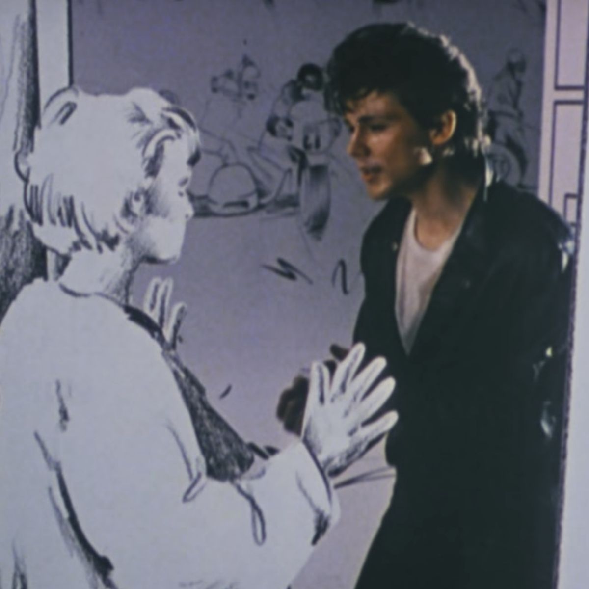 A frame from the video "Take On Me" by the group "A-ha"