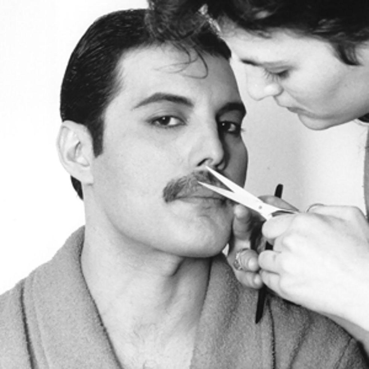 Freddie Mercury cutting his mustache