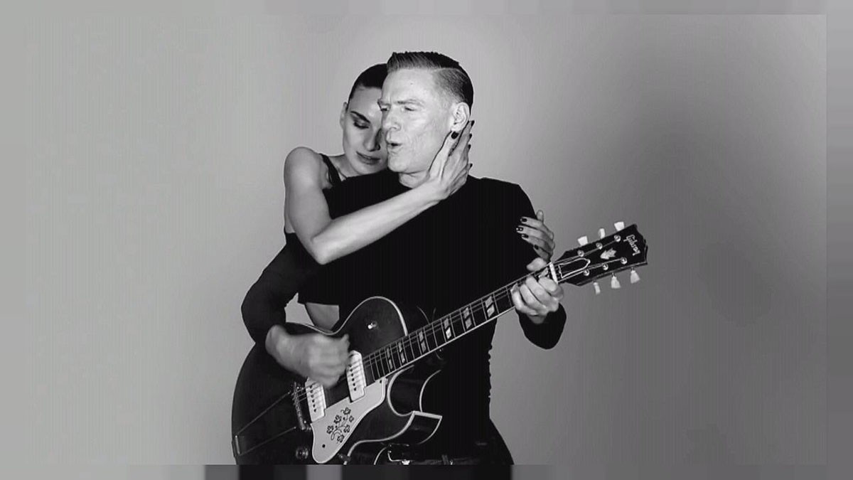 Bryan Adams in the video for the song You Belong To Me