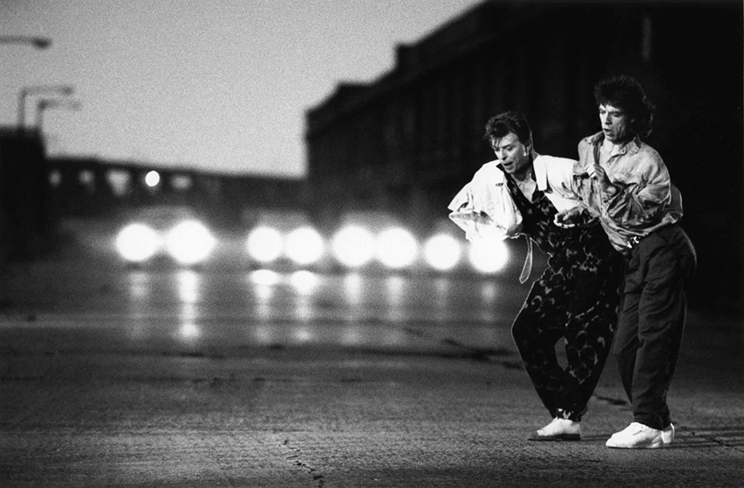 During the filming of the video for Dancing in the Street (1985). David Bowie and Mick Jagger