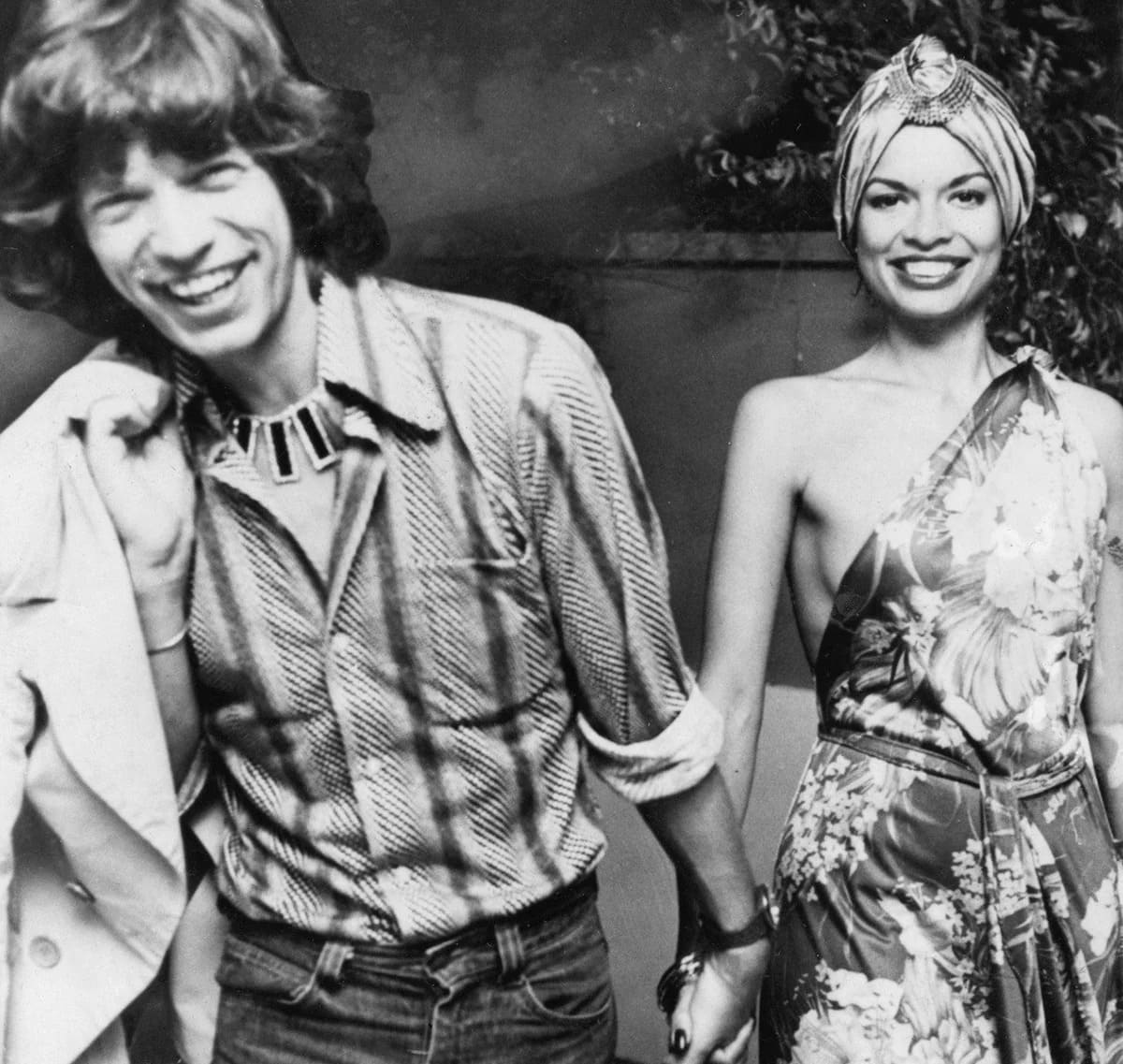Glückliche Mick und Bianca Jagger