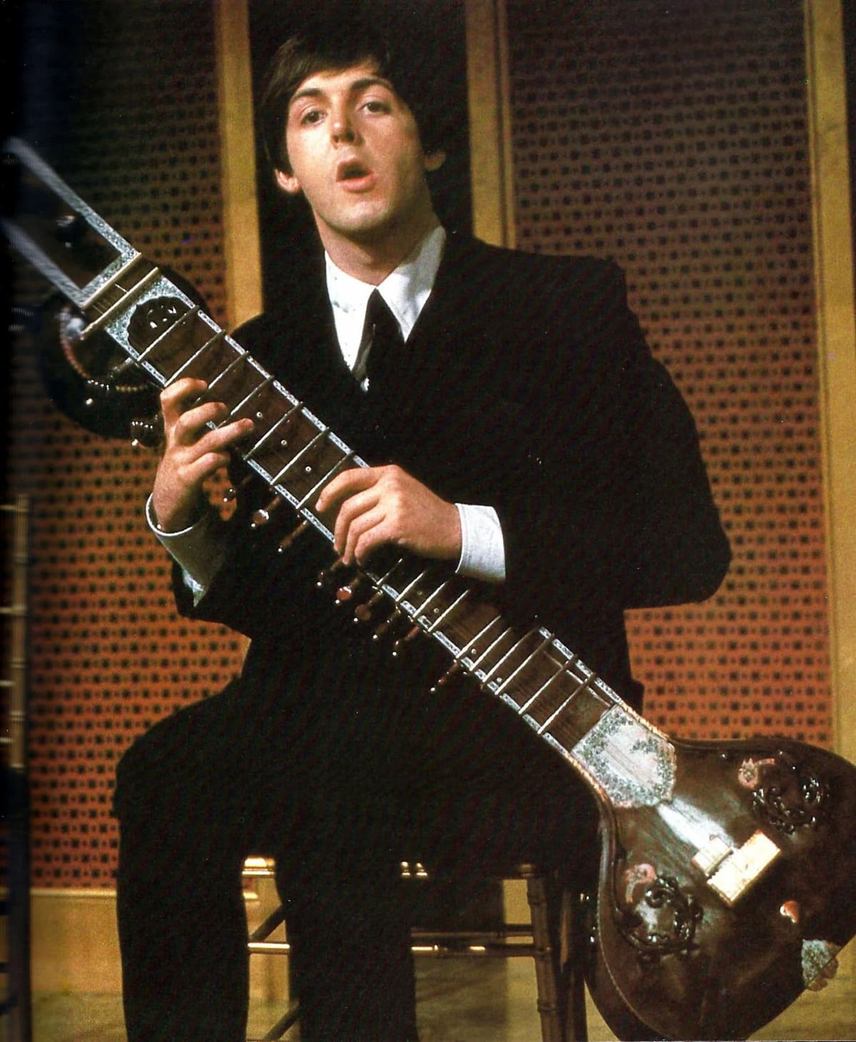 Paul McCartney plays the sitar