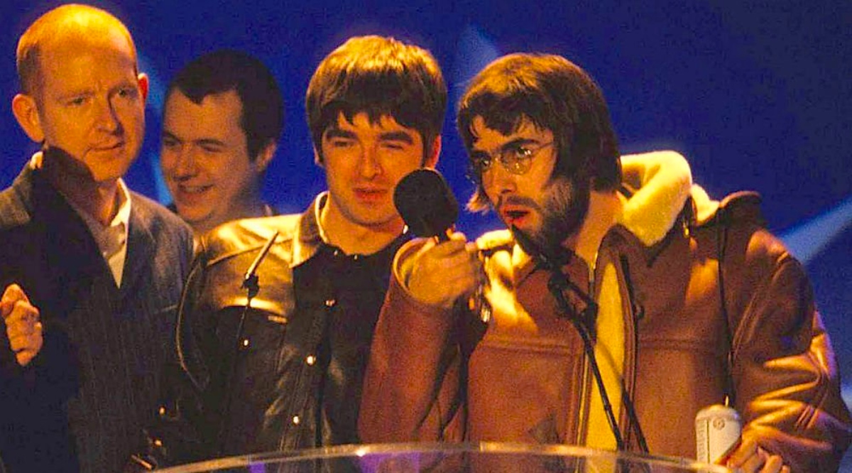 Alan McGee y Oasis