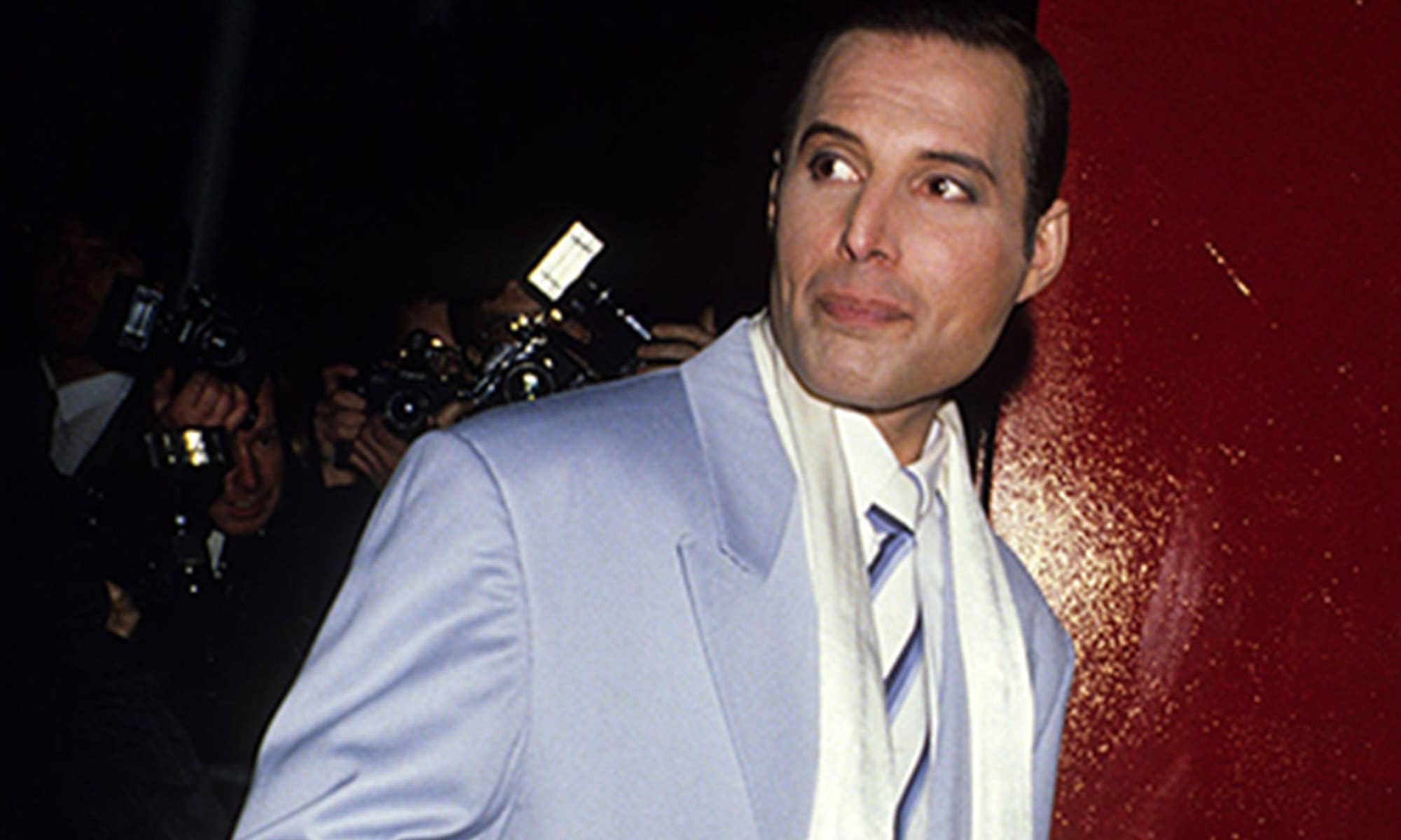 Freddie Mercury in a lavender suit