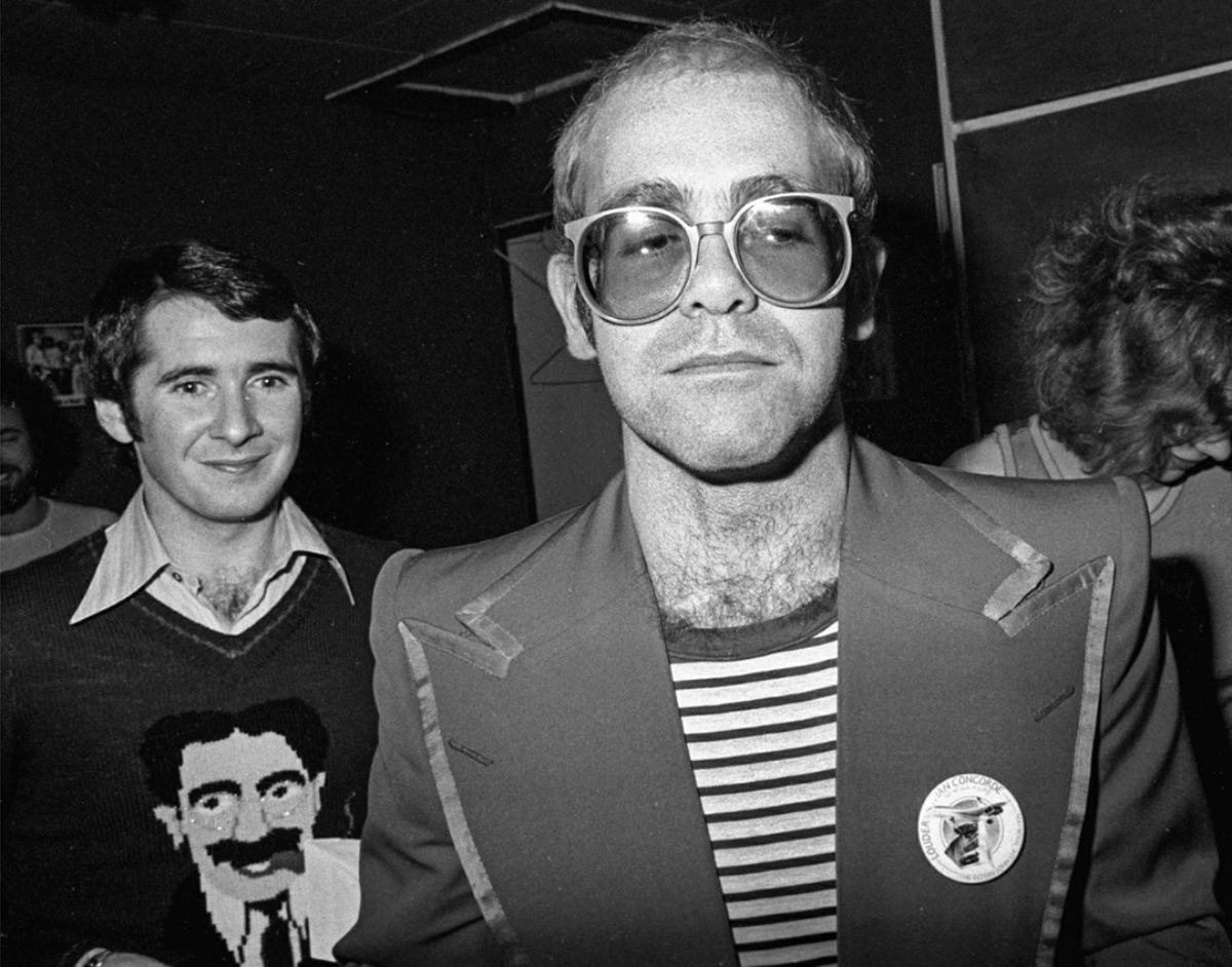 Elton John et John Reid (arrière)