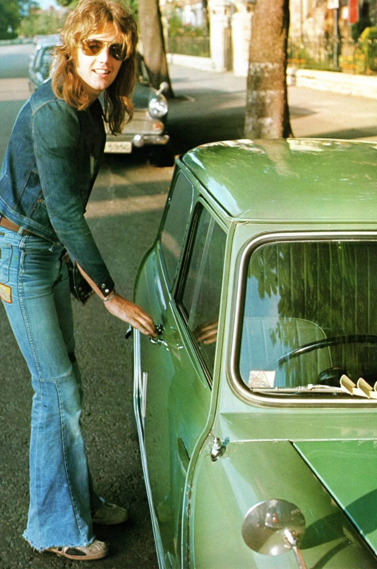 Roger Taylor with a car