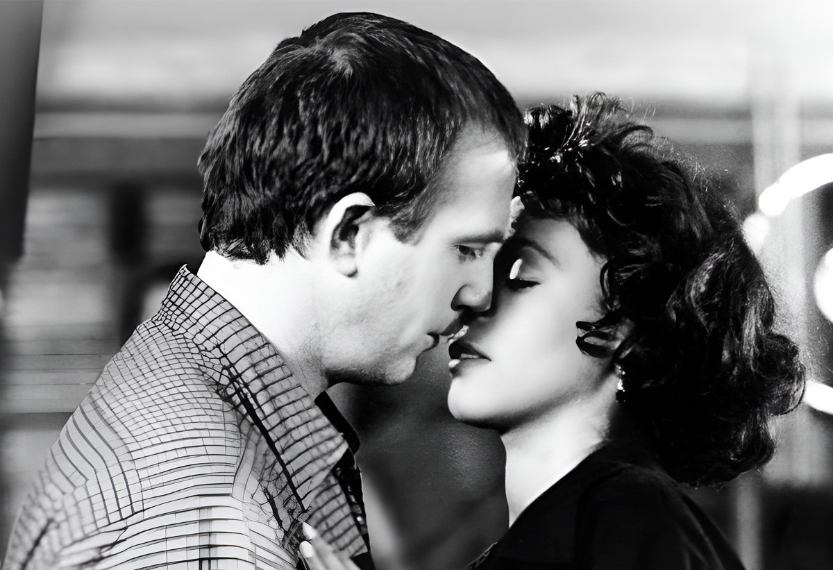 Los personajes de la película, Rachel y Frank, interpretados por Huston y Costner